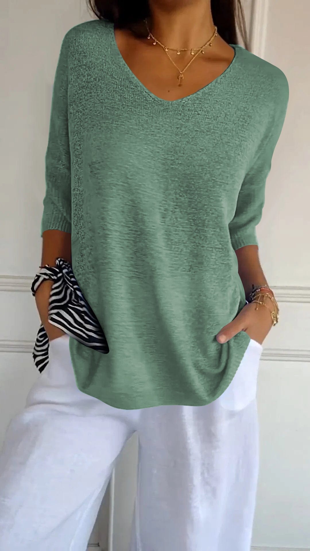 RIA™ | MAGLIA CLASSICA CON SCOLLO A V