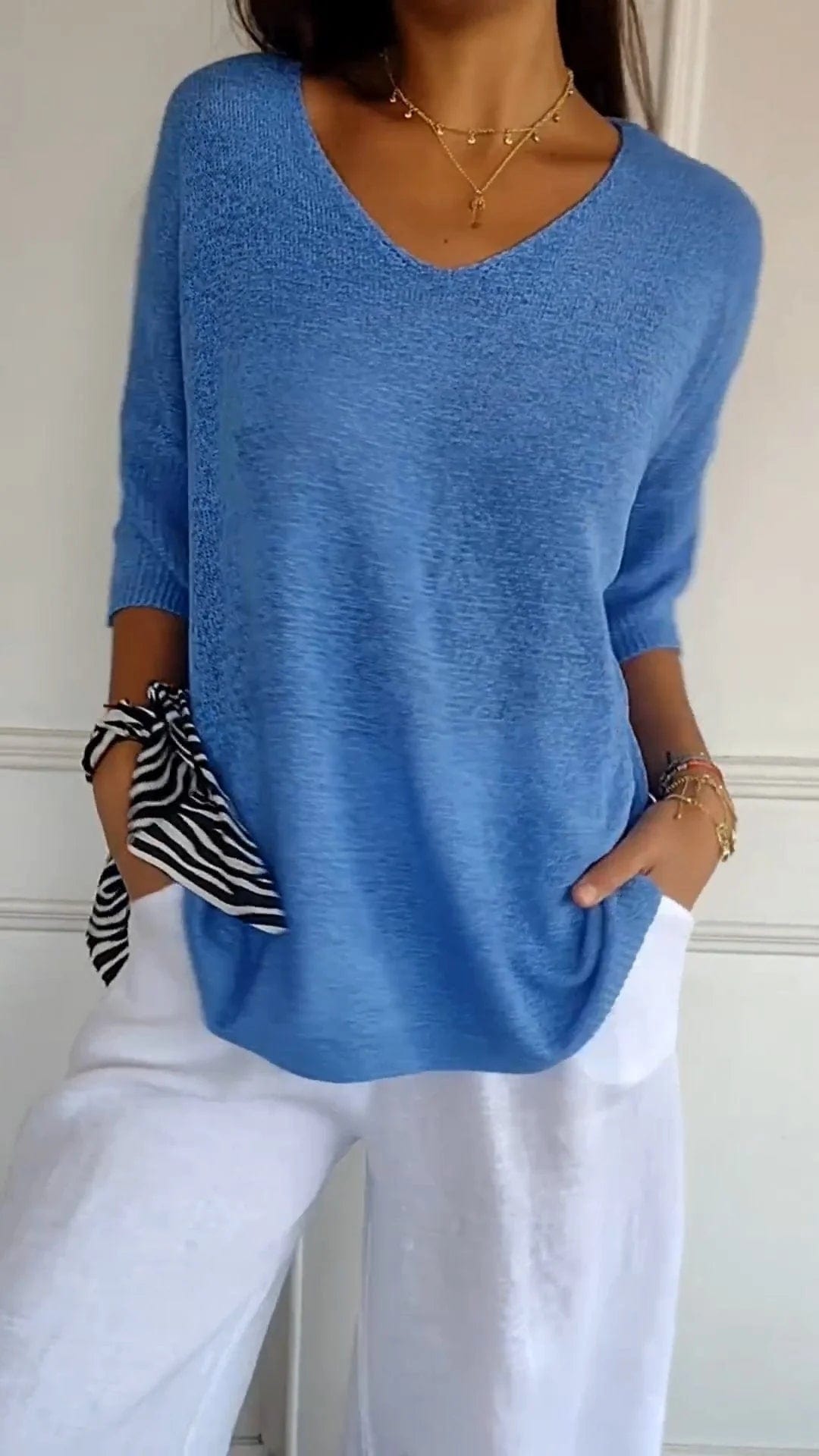 RIA™ | MAGLIA CLASSICA CON SCOLLO A V