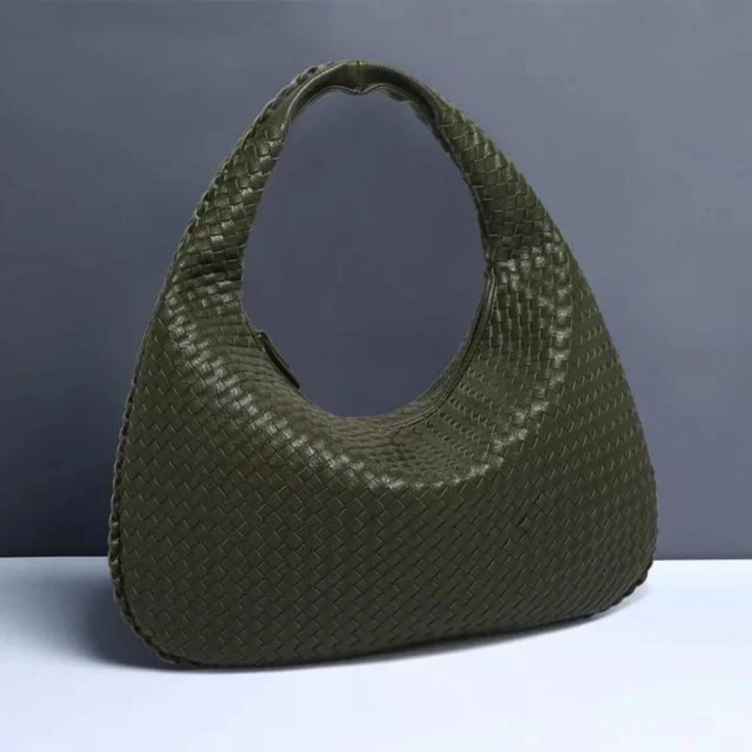 NORA - BORSA A MANO INTRECCIATA DI TENDENZA