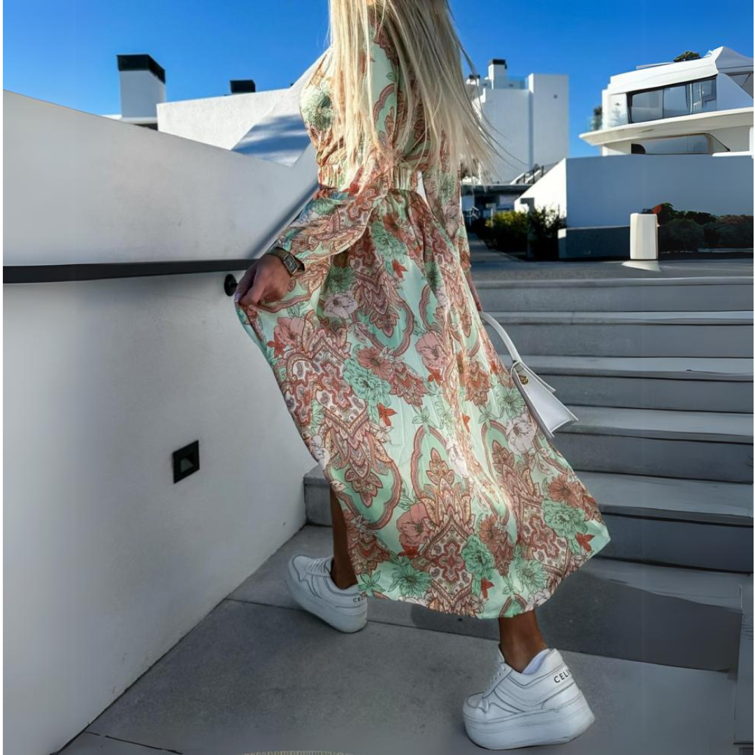JULIA - ABITO A PORTAFOGLIO FLOREALE CON SCOLLO A V E SPACCO CHIC