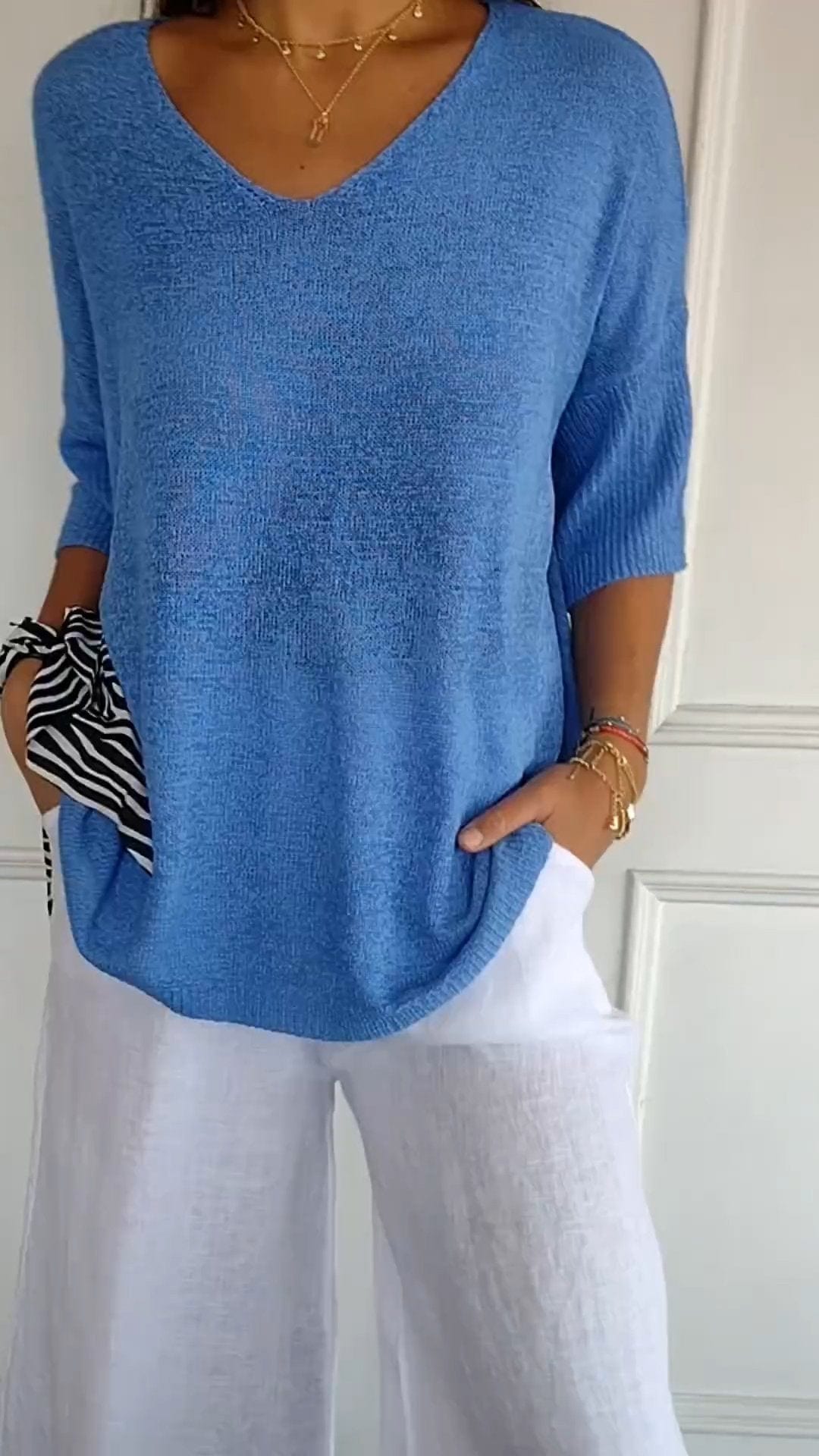 RIA™ | MAGLIA CLASSICA CON SCOLLO A V